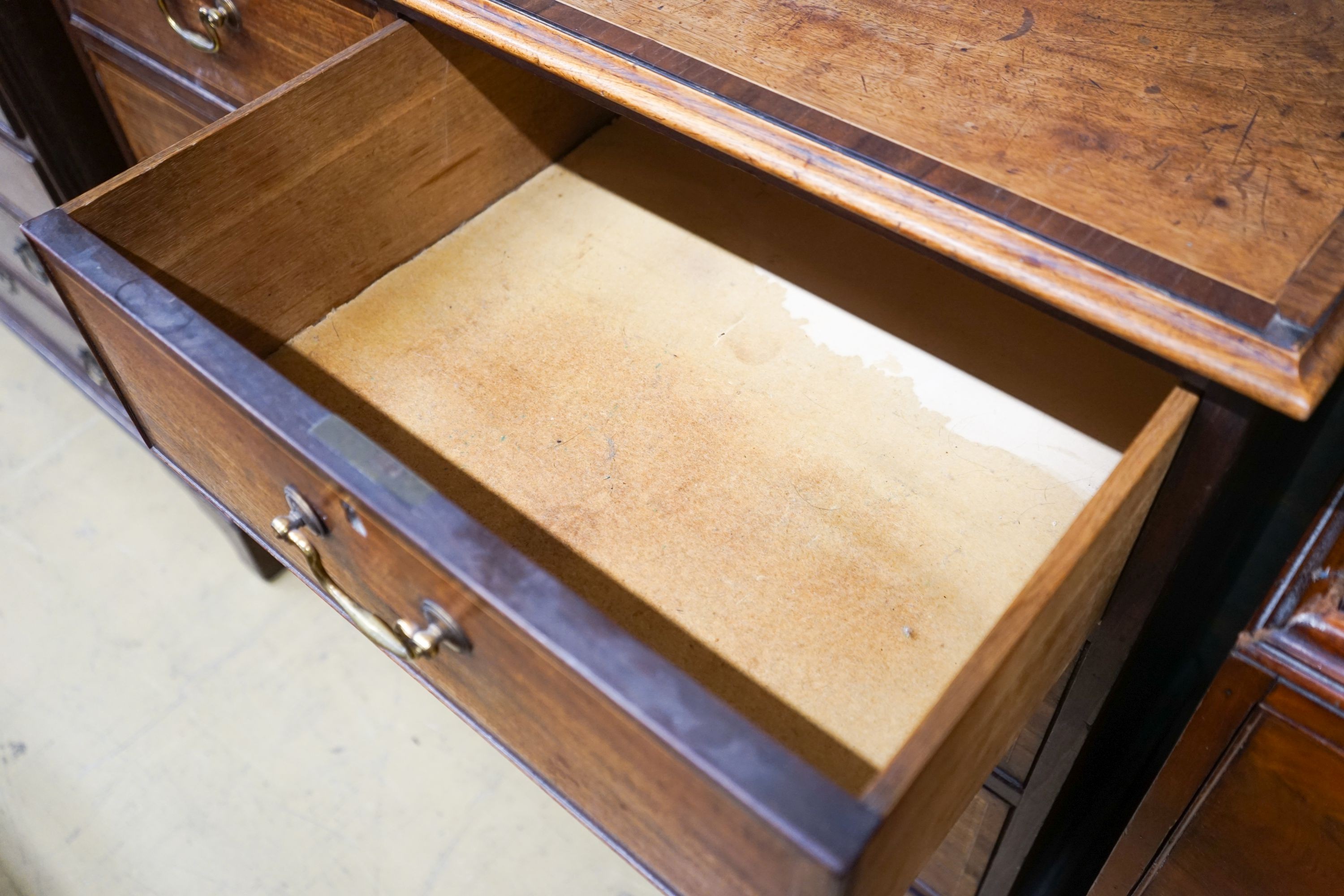 A George III banded mahogany chest, width 110cm, depth 55cm, height 110cm